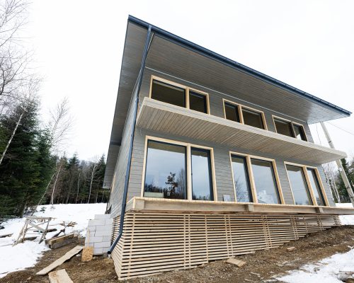 Alone wooden country house in snowy mountains. Soul weekends. Life without neighbors.