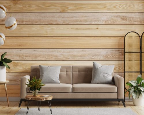Sofa in modern living room with behind the wooden wall.3D rendering