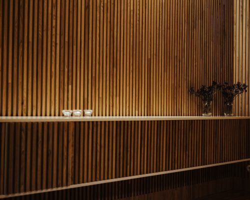 A wall made with slatted wood